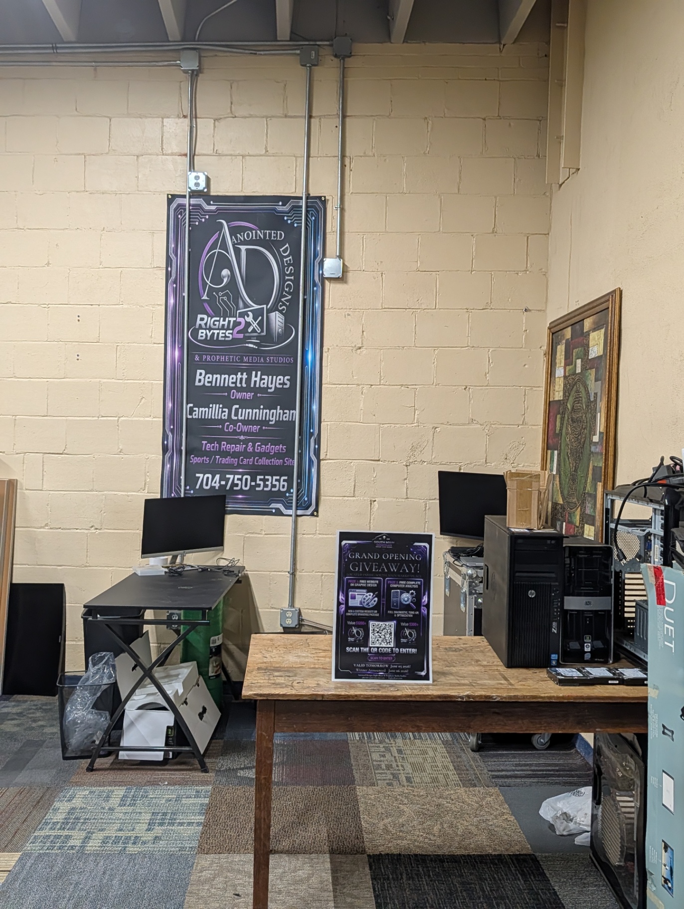 Grand opening giveaway table with QR code