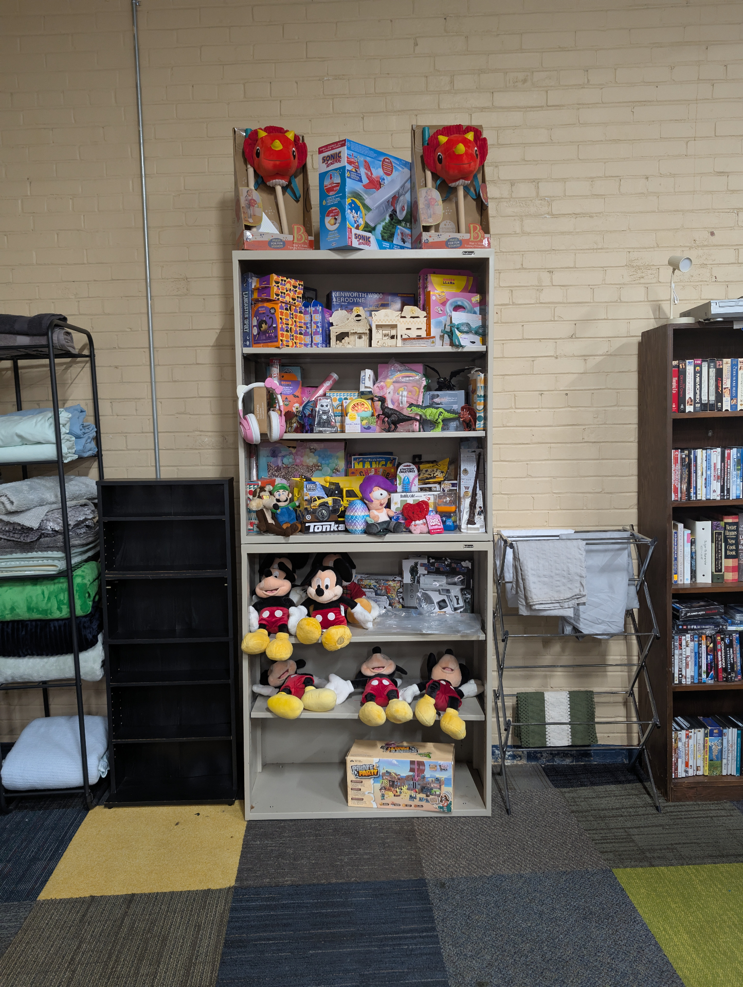 Shelves of toys, plush characters and games at the marketplace