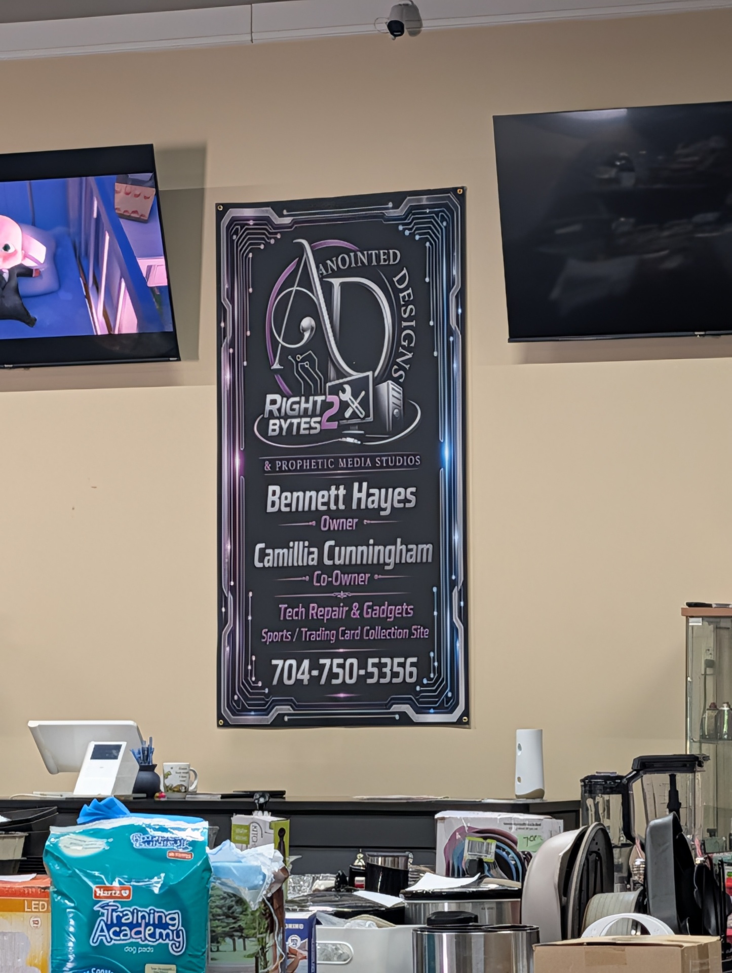 Vendor banner with TVs inside the marketplace